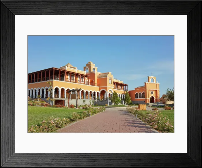Framed Print : The main facade of La Caravedo'Hacienda & Distillery, Ica, Peru. La Caravado is the producer of the famous Pisco Porton