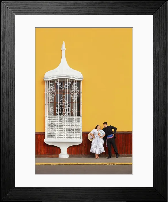 Framed Print : A couple of traditional Marinera'dancers in front of a colonial architecture window of the Plaza de Armas'in Trujillo, La Libertad, Peru. Marinera is the Peruvian National dance. (MR) Framed Print : A couple of traditional Marinera'dancers in front of a colonial architecture window of the Plaza de Armas'in Trujillo, La Libertad, Peru. Marinera is the Peruvian National dance. (MR)