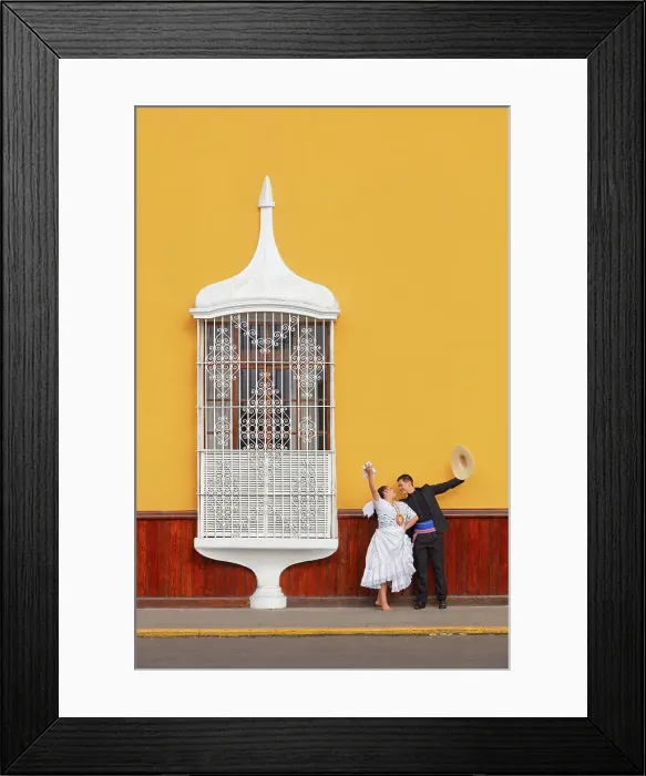 Framed Print : A couple of traditional Marinera'dancers in front of a colonial architecture window of the Plaza de Armas'in Trujillo, La Libertad, Peru. Marinera is the Peruvian National dance. (MR) Framed Print : A couple of traditional Marinera'dancers in front of a colonial architecture window of the Plaza de Armas'in Trujillo, La Libertad, Peru. Marinera is the Peruvian National dance. (MR)
