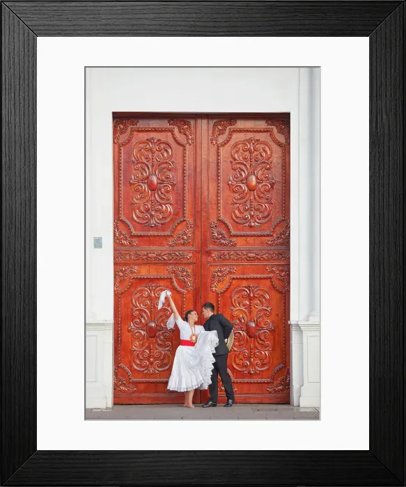 Framed Print : A couple of traditional Marinera'dancers in front of a colonial architecture door in the Plaza de Armas'of Trujillo, La Libertad, Peru. Marinera is the Peruvian National dance. (MR) Framed Print : A couple of traditional Marinera'dancers in front of a colonial architecture door in the Plaza de Armas'of Trujillo, La Libertad, Peru. Marinera is the Peruvian National dance. (MR)