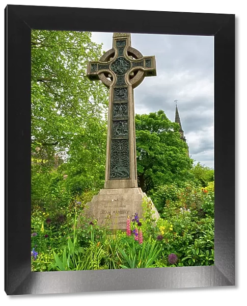 Dean Ramsay Memorial Cross, with tower of the parish church of St. Cuthbert in background, Edinburgh, Lothian, Scotland, UK