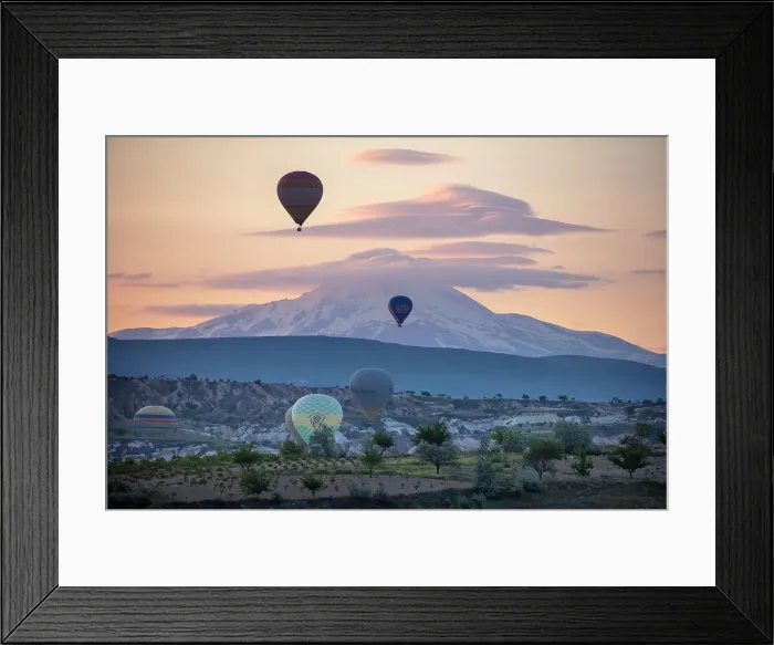 Framed Print : Hot air balloons at dawn in front of Mount Erciyes, Goreme, Cappadocia, Nevsehir Province, Central Anatolia, Turkey Framed Print : Hot air balloons at dawn in front of Mount Erciyes, Goreme, Cappadocia, Nevsehir Province, Central Anatolia, Turkey