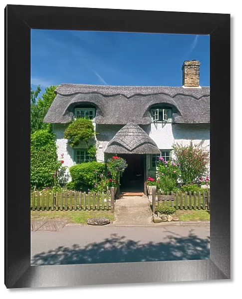 UK, England, Cambridgeshire, Bourn, Traditional thatched cottage
