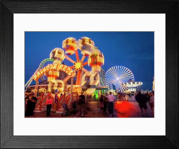 Framed Print : The Wildwoods consist of three municipalities: Wildwood, Wildwood Crest and North Wildwood which reside on a barrier island just north of Cape May New Jersey. The Wildwood beach and its boardwalk are a popular resort destination