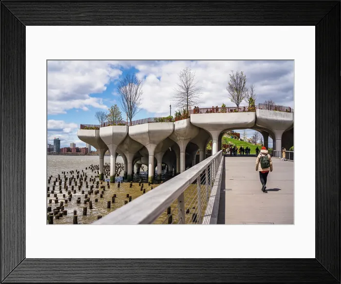 Framed Print : Woman tourist walkint to Little Island, New York City, USA (MR) Framed Print : Woman tourist walkint to Little Island, New York City, USA (MR)