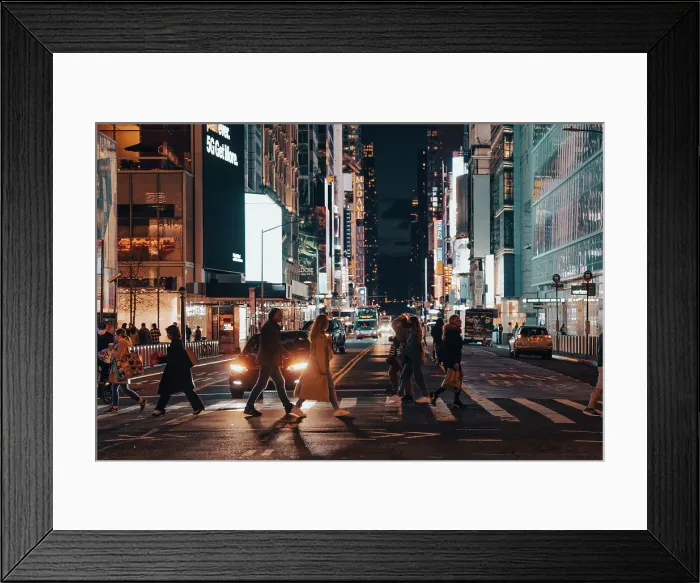 Framed Print : New York City streets at night, people and city lights, USA Framed Print : New York City streets at night, people and city lights, USA