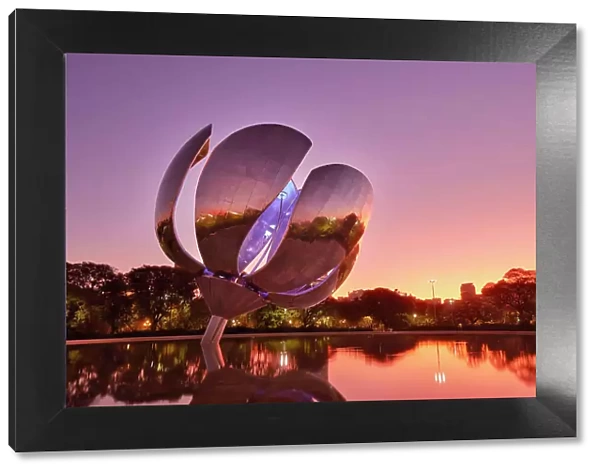 The 'Floralis Generica' monument at twilight, Recoleta, Buenos Aires, Argentina. It was created in 2002 by artist Eduardo Catalano