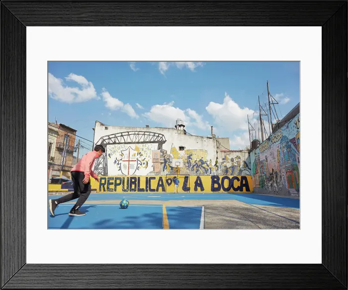 Framed Print : Local people playing football in La Boca district, Buenos Aires, Argentina Framed Print : Local people playing football in La Boca district, Buenos Aires, Argentina