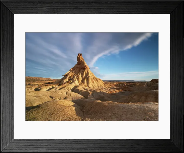 Framed Print : the iconic rock formation called Castel de Tierra during a warm summer sunrise, Bardenas Reales Natural Park, Navarra, Spain Framed Print : the iconic rock formation called Castel de Tierra during a warm summer sunrise, Bardenas Reales Natural Park, Navarra, Spain