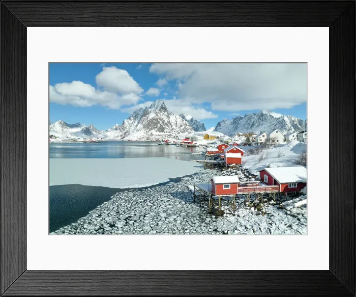 Framed Print : Winter day in Reine village with mountain peak covered with snow, Lofoten Islands, Norway Framed Print : Winter day in Reine village with mountain peak covered with snow, Lofoten Islands, Norway