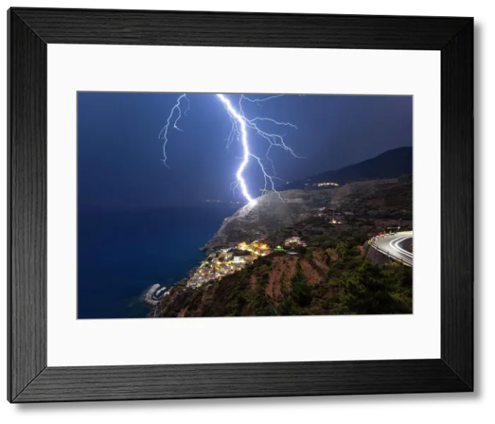 Framed Print : lightning strikes the vineyards of Riomaggiore during an summer night, National Park of Cinque Terre, Riomaggiore, La Spezia, Liguria, Italy Framed Print : lightning strikes the vineyards of Riomaggiore during an summer night, National Park of Cinque Terre, Riomaggiore, La Spezia, Liguria, Italy