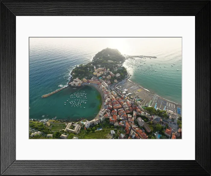 Framed Print : aerial view taken by drone of Silenzio bay, during a warm summer sunset, municipality of Sestri Levante, Genova province, Liguria district, Italy Framed Print : aerial view taken by drone of Silenzio bay, during a warm summer sunset, municipality of Sestri Levante, Genova province, Liguria district, Italy
