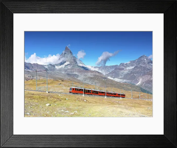 Framed Print : the iconic red train over the Gornegrat railway, with the Matterhorn mountain in background, Zermatt, Canton of Valais, Switzerland Framed Print : the iconic red train over the Gornegrat railway, with the Matterhorn mountain in background, Zermatt, Canton of Valais, Switzerland