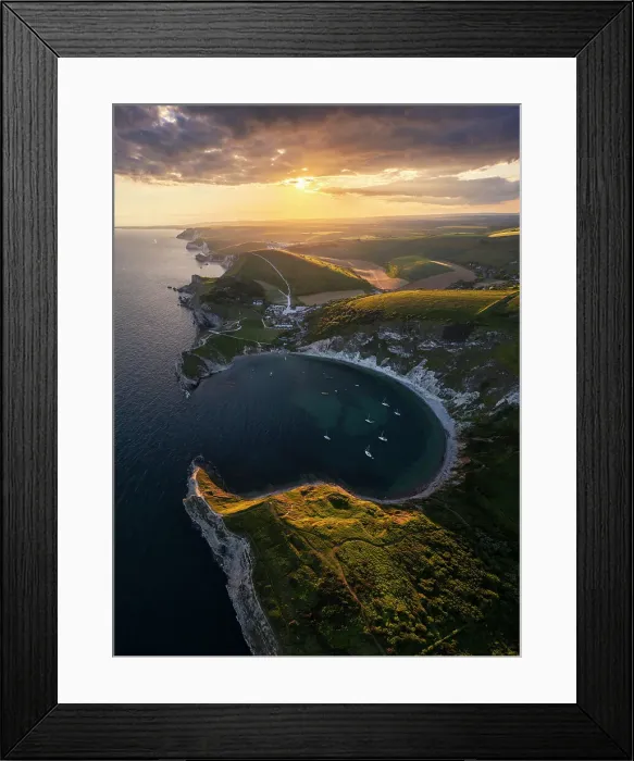 Framed Print : Aerial view of Lulworth Cove at sunset with boats, Durdle Door, Dorset, United Kingdom Framed Print : Aerial view of Lulworth Cove at sunset with boats, Durdle Door, Dorset, United Kingdom