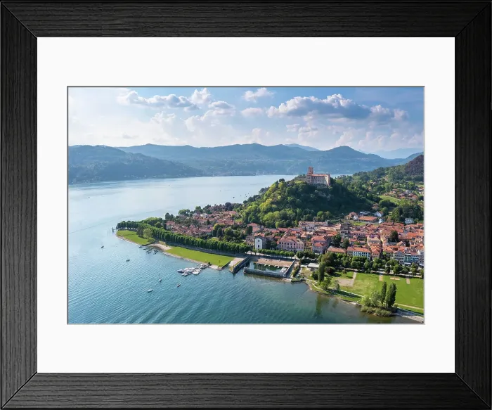 Framed Print : View of the town of Angera and its fortress called Rocca di Angera on a spring day. Angera, Lake Maggiore, Varese district, Lombardy, Italy Framed Print : View of the town of Angera and its fortress called Rocca di Angera on a spring day. Angera, Lake Maggiore, Varese district, Lombardy, Italy