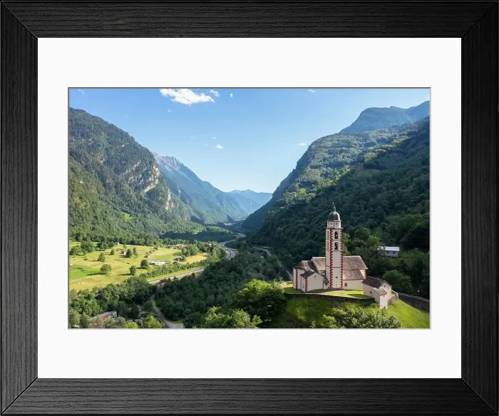 Framed Print : San martino church of Soazza dominating the road to San Bernardino pass. Graubunden, Moesa district, Switzerland Framed Print : San martino church of Soazza dominating the road to San Bernardino pass. Graubunden, Moesa district, Switzerland