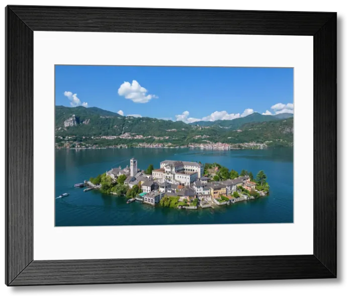 Framed Print : Aerial view of San Giulio island and Lake Orta in the summer. Orta Lake, Province of Novara, Piedmont, Italy
