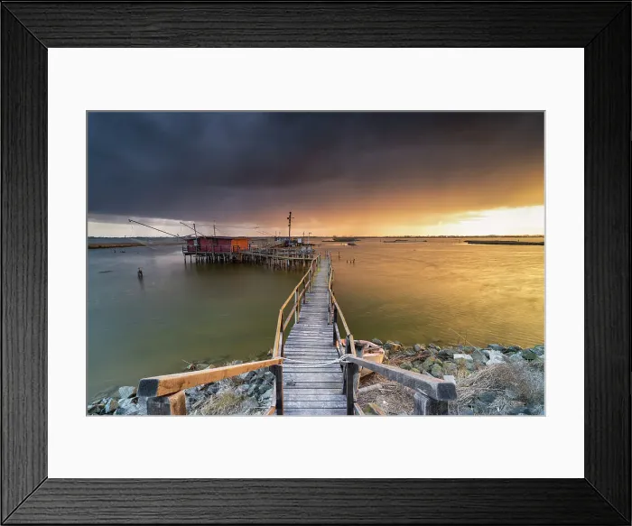 Framed Print : Trebuchet during a sunrise in Comacchio Lido, Emilia Romagna, Ferrara province in Italy Framed Print : Trebuchet during a sunrise in Comacchio Lido, Emilia Romagna, Ferrara province in Italy
