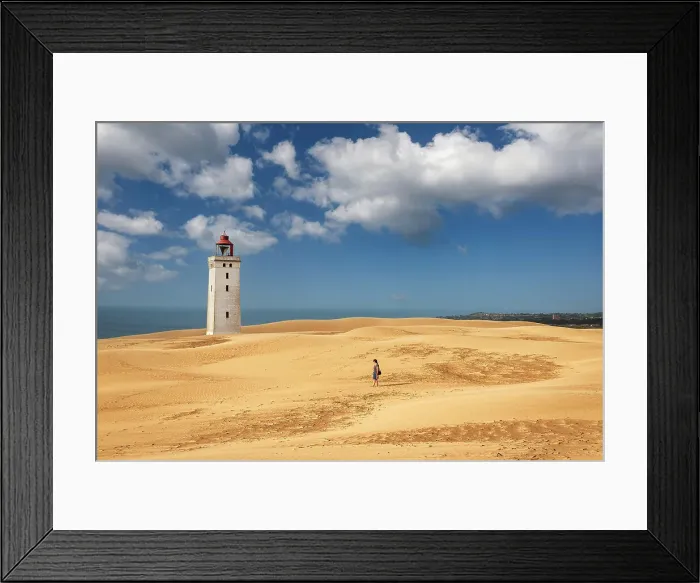 Framed Print : Woman walks on sand dunes in front of the lighthouse of Rubjerg Knude, Hjorring municipality, north Jutland region, Jutland, north of Denmark, Denmark, Europe Framed Print : Woman walks on sand dunes in front of the lighthouse of Rubjerg Knude, Hjorring municipality, north Jutland region, Jutland, north of Denmark, Denmark, Europe