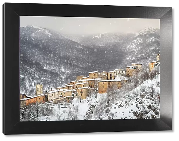 Snowfall on the old village of Villalago, Abruzzo national park, L'aquila province, Abruzzo, Italy