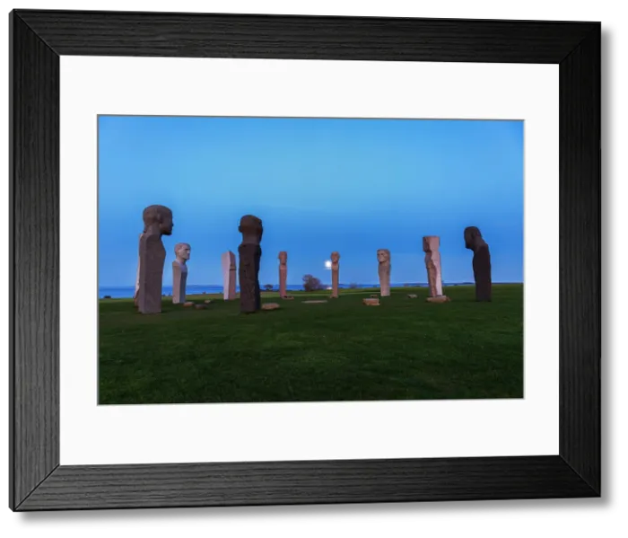 Framed Print : Full moon rising behind the stone statues of Dodekalitten at dusk, Lolland island, Zealand, Denmark Framed Print : Full moon rising behind the stone statues of Dodekalitten at dusk, Lolland island, Zealand, Denmark
