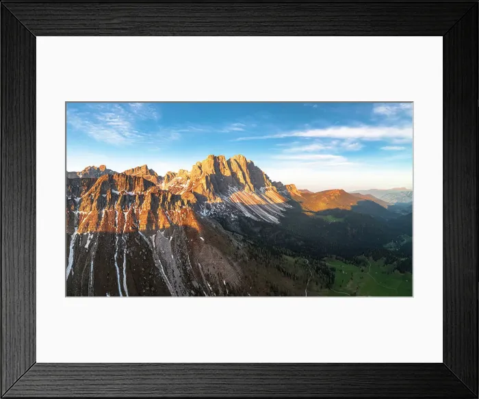 Framed Print : Majestic rocks of the Odle group lit by sunrise, aerial view, Funes Valley, Dolomites, South Tyrol, Italy Framed Print : Majestic rocks of the Odle group lit by sunrise, aerial view, Funes Valley, Dolomites, South Tyrol, Italy