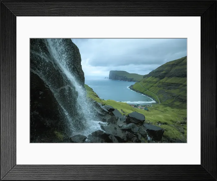 Framed Print : A part of the village of Tjornuvik seen from the mountain. In the background the Rising and Kellingin sea stacks. Island of Streymoy. Faroe Islands Framed Print : A part of the village of Tjornuvik seen from the mountain. In the background the Rising and Kellingin sea stacks. Island of Streymoy. Faroe Islands