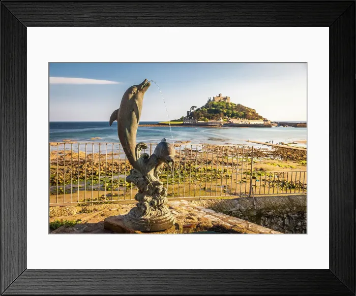 Framed Print : Dolphin statue overlooking St Michael`s Mount, Marazion, Cornwall, England Framed Print : Dolphin statue overlooking St Michael`s Mount, Marazion, Cornwall, England