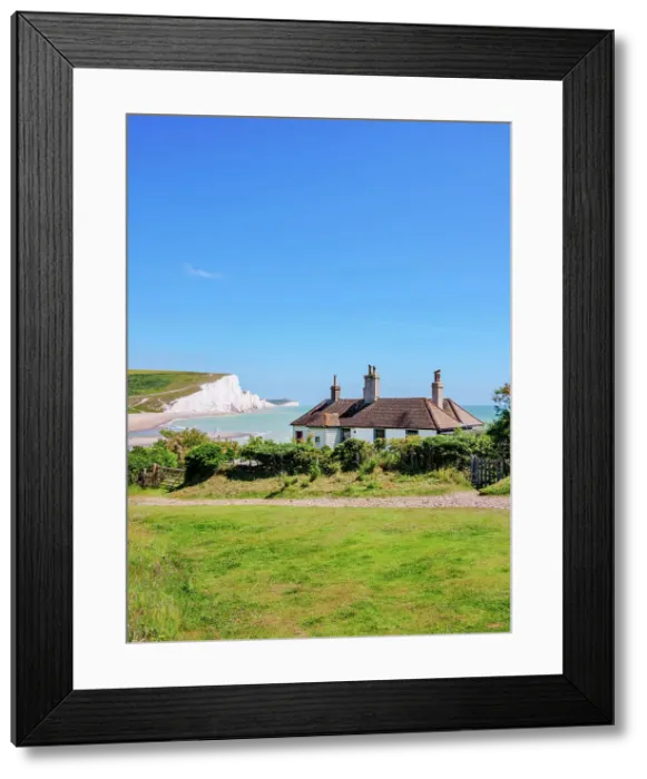 Framed Print : Coastguard Cottage and Seven Sisters Cliffs, Cuckmere Haven, East Sussex, England, United Kingdom Framed Print : Coastguard Cottage and Seven Sisters Cliffs, Cuckmere Haven, East Sussex, England, United Kingdom