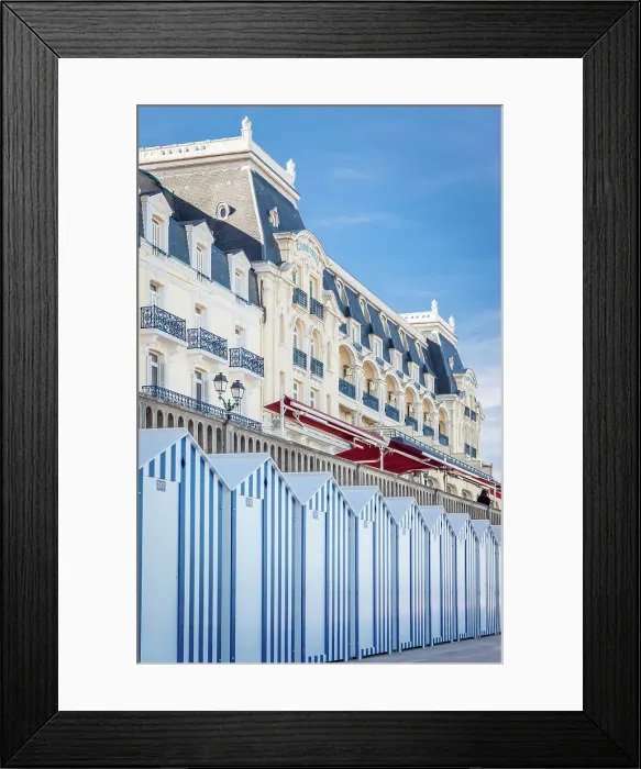 Framed Print : Historic Grand Hotel and changing rooms in Cabourg on the beach, Calvados, Normandy, France Framed Print : Historic Grand Hotel and changing rooms in Cabourg on the beach, Calvados, Normandy, France