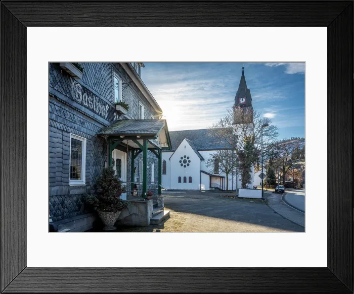Framed Print : Traditional inn Hochheide and village church in Niedersfeld near Winterberg, Sauerland, North Rhine-Westphalia, Germany