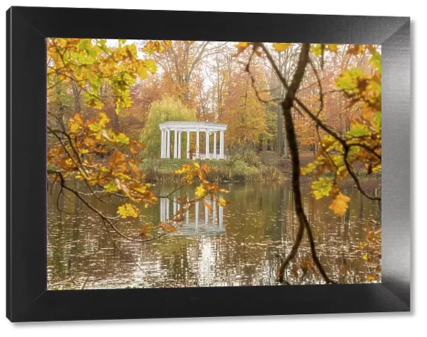 Pond with island and colonnades in Kleiner Tannenwald park in Bad Homburg vor der Hoehe, Taunus, Hesse, Germany