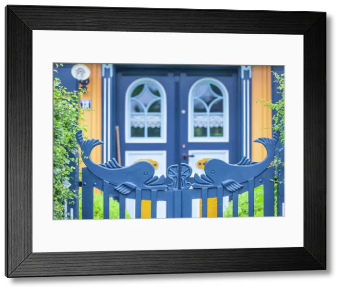 Framed Print : Entrance gate with whales at a beautiful, old thatched roof house in Born am Darss, Mecklenburg-West Pomerania, Baltic Sea, Northern Germany, Germany Framed Print : Entrance gate with whales at a beautiful, old thatched roof house in Born am Darss, Mecklenburg-West Pomerania, Baltic Sea, Northern Germany, Germany