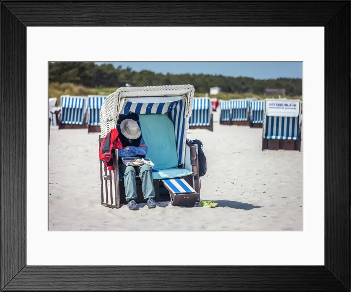 Framed Print : Man sleeping in a beach chair on the beach at Zingst, Mecklenburg-Western Pomerania, Baltic Sea, Northern Germany, Germany