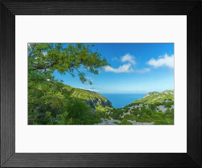 Framed Print : Europe, Italy, Sardinia. View from the footpath towards the rock formations of Cala Goloritze