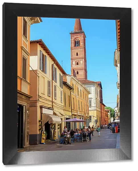 Old town street leading to Santa Maria del Carmine church, Pavia, Lombardy, Italy