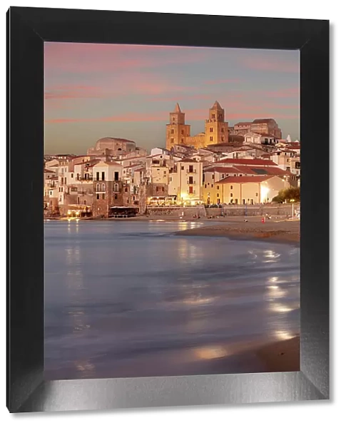 Italy, Sicily, Cefalu, the old town illuminated at sunset