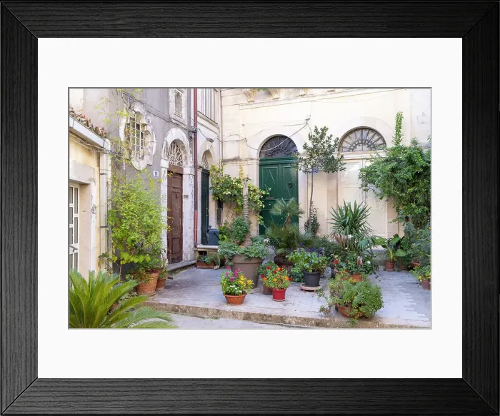 Framed Print : Italy, Sicily, Ragusa, a courtyard full of colourful plants and flowers in Ragusa Ibla Framed Print : Italy, Sicily, Ragusa, a courtyard full of colourful plants and flowers in Ragusa Ibla