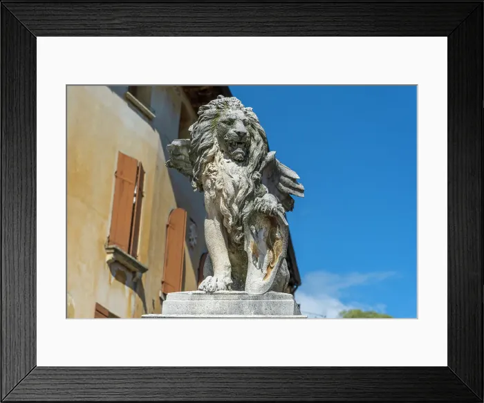 Framed Print : Italy, Veneto. A statue of a lion with wings in the town of Asolo