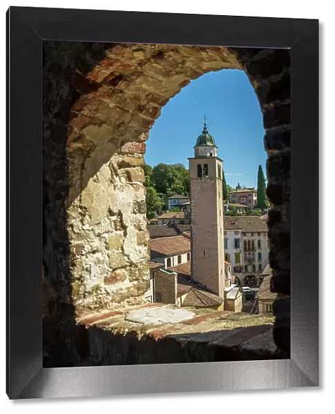 Italy, Veneto. Asolo, view above the roofs towards the tower of the cathedral