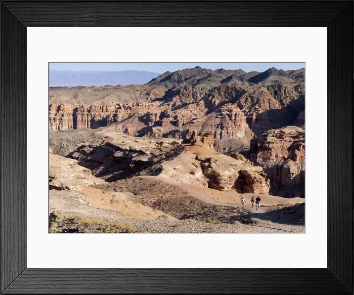 Framed Print : Kazakhstan, Charyn Canyon National Park, visitors hike through the canyon Framed Print : Kazakhstan, Charyn Canyon National Park, visitors hike through the canyon