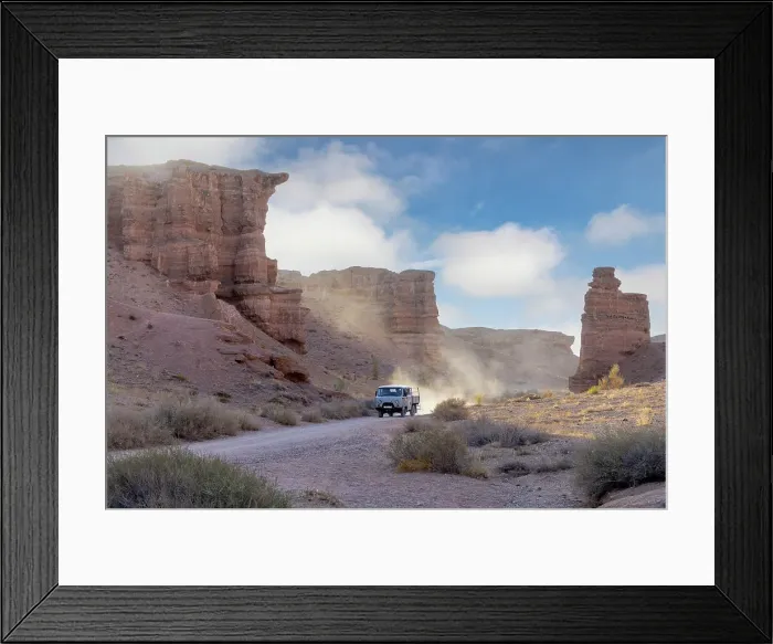Framed Print : Kazakhstan, Charyn Canyon, an old bus drives through the canyon Framed Print : Kazakhstan, Charyn Canyon, an old bus drives through the canyon