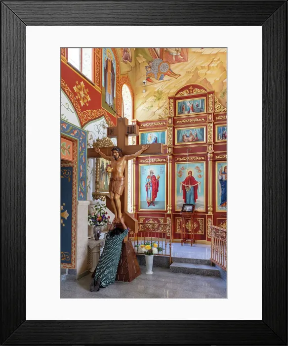 Framed Print : Kyrgyzstan, Bishkek, Holy Resurrection Cathedral, a local woman prays beneath Jesus on the cross Framed Print : Kyrgyzstan, Bishkek, Holy Resurrection Cathedral, a local woman prays beneath Jesus on the cross