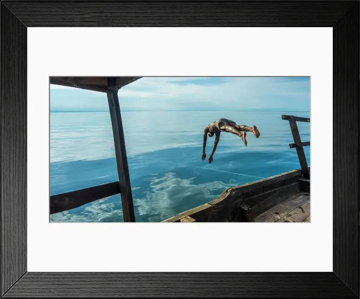 Framed Print : Africa, Tanzania, Mahale Mountains National Park. Jumping for a swim in the Tanganyika lake Framed Print : Africa, Tanzania, Mahale Mountains National Park. Jumping for a swim in the Tanganyika lake