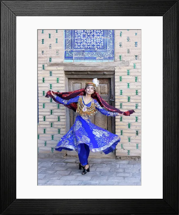 Framed Print : Uzbekistan, Khiva, Harem of the Tash Kauli complex, an Uzbek woman dressed in traditional costume dances Framed Print : Uzbekistan, Khiva, Harem of the Tash Kauli complex, an Uzbek woman dressed in traditional costume dances