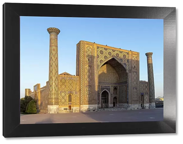 Uzbekistan, Samarkand, Registan square, Ulugh Beg Madrasah at sunrise