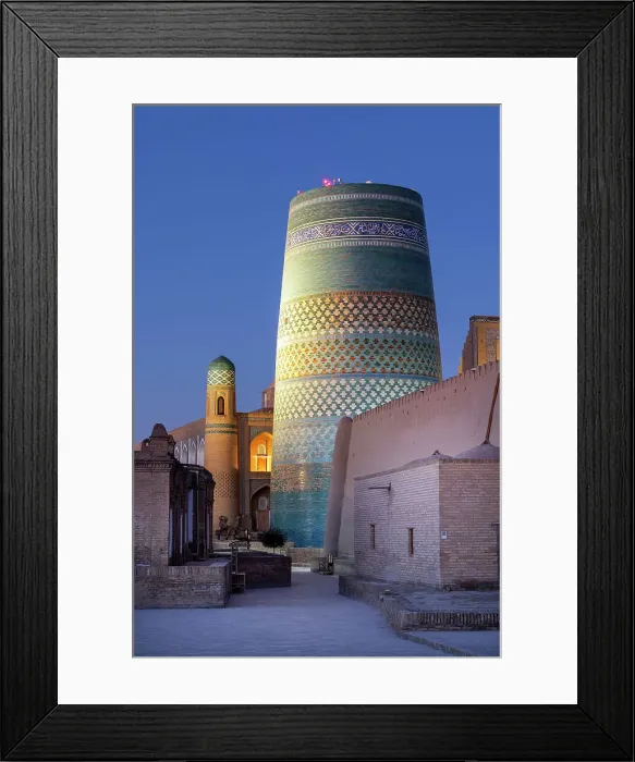 Framed Print : Uzbekistan, Khiva, the Khuna Ark citadel and the Kalta Minor minaret illuminated at sunrise Framed Print : Uzbekistan, Khiva, the Khuna Ark citadel and the Kalta Minor minaret illuminated at sunrise