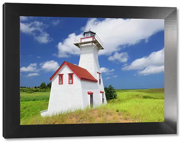 Lighthouse and clouds Prince Edward Island, Canada