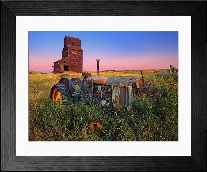 Framed Print : Grain elevator with old tractor at dawn Bents Saskatchewan, Canada