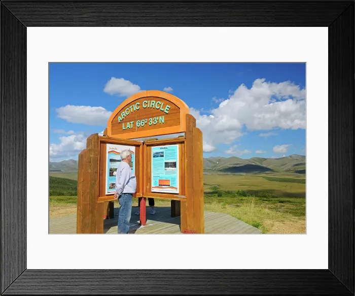 Framed Print : Tourist on the Dempster Highway (KM 405) at the Arctic Circle (model released). Dempster Highway, Yukon, Canada Framed Print : Tourist on the Dempster Highway (KM 405) at the Arctic Circle (model released). Dempster Highway, Yukon, Canada